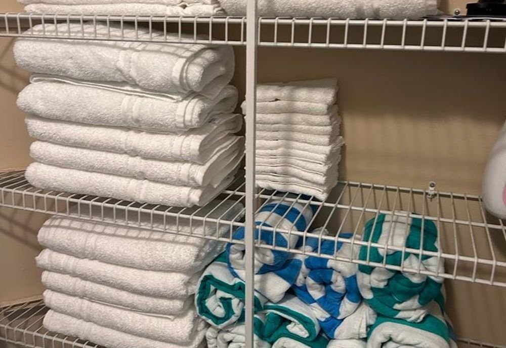 Neatly folded clean laundry and linens